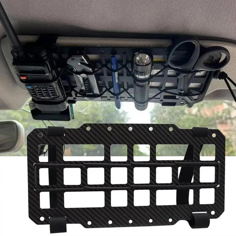 Rugged Tactical Sun Visor Rack With Reinforced Panels And Secure Lash Bands For Tesla Cybertruck, holding tools and flashlights.