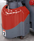 Tory 4400 Lb Electric Pallet Jack Truck With 48 By 27 Forks, close-up of red and gray base with safety features.