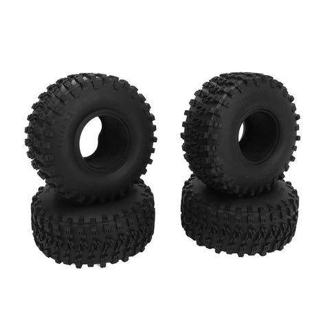Set of four black off-road tires stacked in pairs, featuring deep treads for rugged terrain, suitable for RC cars and similar vehicles.