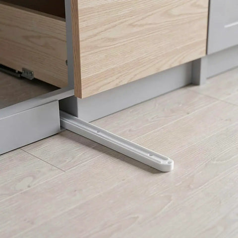 Six Piece Set Of White Plastic Drawer Slides For Kitchen Cabinets Featuring Precision Groove Tracks For No Sweat Assembly Breezy Do It Yourself Installation And Smooth Operator Glide Performance Each Time on a cabinet.
