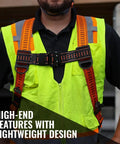 Javelina Fall Protection Safety Harness For Construction Pros, bright orange harness with quick-connect chest strap, worn by worker.