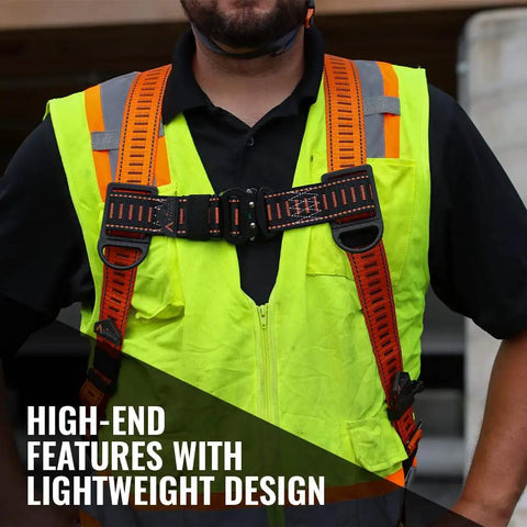 Javelina Fall Protection Safety Harness For Construction Pros, bright orange harness with quick-connect chest strap, worn by worker.
