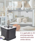Beefy Torque Stepper Motor With 1m Cable For 3D Printers shown in front of 3D printer with intricate models, illustrating application.