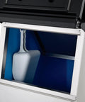 Inside view of Heavy Duty Modular Ice Maker With 275 Pound Storage Bin showing a clear scoop and stainless steel construction.