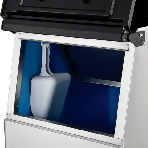 Inside view of Heavy Duty Modular Ice Maker With 275 Pound Storage Bin showing a clear scoop and stainless steel construction.