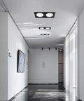 Tashace Led Recessed Ceiling Light Double Head Black Lights for Corridors in sleek corridor setting, showcasing design and illumination.