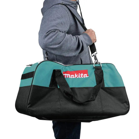Heavy Duty 23 Inch Contractor Tool Bag With Double Wall Construction carried by person, showing large size and sturdy design.