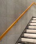 Premium Solid Wood Stair Handrail With Anti Slip Wall Mount Railing For Garage Steps Lofts And Basement Ramps at an angle.