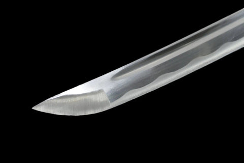 Close-up of Burgundy Red Shirasaya Samurai Katana Dope Hand Honed High Carbon Steel Razor Sharp 27 Inch Blade on black background