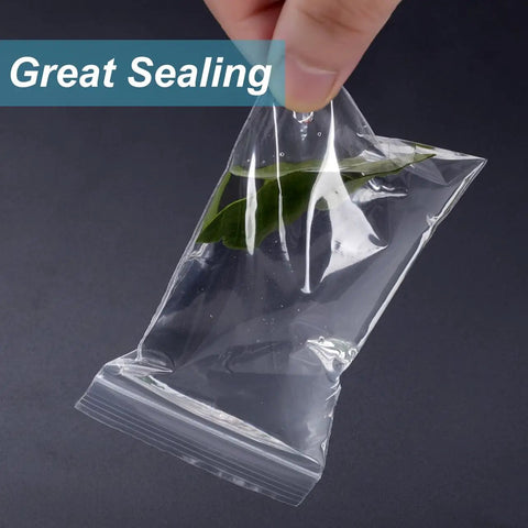 300 Clear Mini Plastic Baggies Two Point Two By Three Inch Reclosable Bags For Beads Jewelry Pills Screws Crafts And Packaging Food Grade Safe Easy Seal Resealable Poly Bags With Blank Sticker Tags showing great sealing.