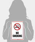 Straight Up Heavy Duty Aluminum No Smoking Sign For Your Company Setup Keep The Shop Floor Smoke Free Rust Resistant Indoor Outdoor Metal Wall Plate Super Durable displayed by a person.