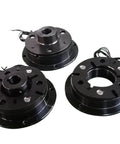 Three black DZD5 electromagnetic brake housings with central bore and wiring for clutch assembly