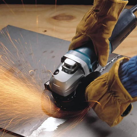 Workhorse High-Power 4 1/2 Inch Angle Grinder With SJS Mechanical Clutch grinding metal, sparks flying, 13 Amp motor