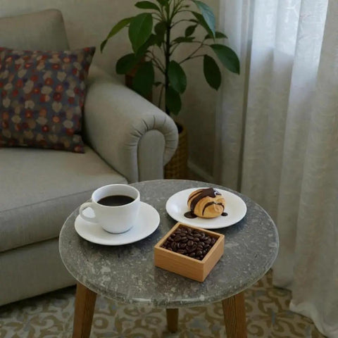 16 Inch Marble Lazy Susan Round Stone Rotating Serving Tray with coffee and pastry in living room setting, elegant marble top.