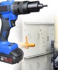 Cordless Electric Rivet Gun Featuring Brushless Auto Feed, Heavy Duty Plug And Play Blind Riveter And Nut Setter in workshop setting.
