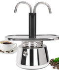 Premium Stainless Steel Moka Pot With Heavy Duty Dual Pipe Flow Tech For Pullin Quick Stovetop Espresso On Gas Or Induction Cooktops close-up with cup of coffee and beans.