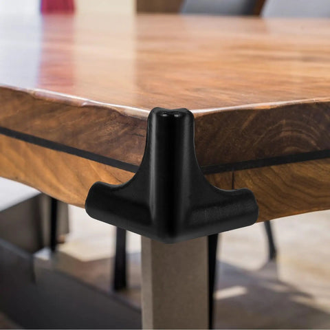 Silicone Corner Guards 4 Pack For Furniture And Tables installed on wooden table edge, easy to install edge bumpers for safety