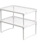 Stackable Metal Wire Racks For Kitchen Cabinets And Pantries Beat The Kitchen Chaos Easy Storage Solutions Heavy Duty Steel Organizer Shelves Set Of Two White metal wire rack with two levels for kitchen organization.