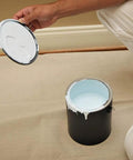 Heavyweight Canvas Drop Cloth 4 Ft By 5 Ft 10 Oz Contractor Grade under paint can with lid, ideal for painting, indoor outdoor use
