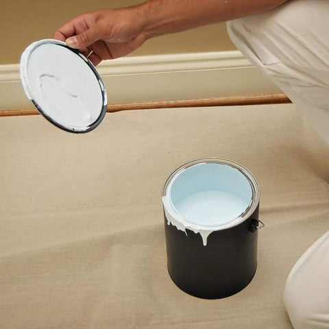 Person using Heavy Duty Canvas Drop Cloth 4 Ft By 12 Ft Tan Protect Floors From Paint Spills In Hallways And Narrow Spaces Washable