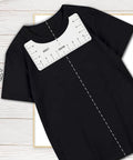 DIY T Shirt Alignment Tool Kit With Heat Resistant Tape And PTFE Teflon Transfer Sheets Four Ruler Sizes Two Rolls Heat Resistant Tape Three Packs PTFE Sheets And One Tape Measure Included For Quick Centered Transfers. Ruler centered on black shirt.