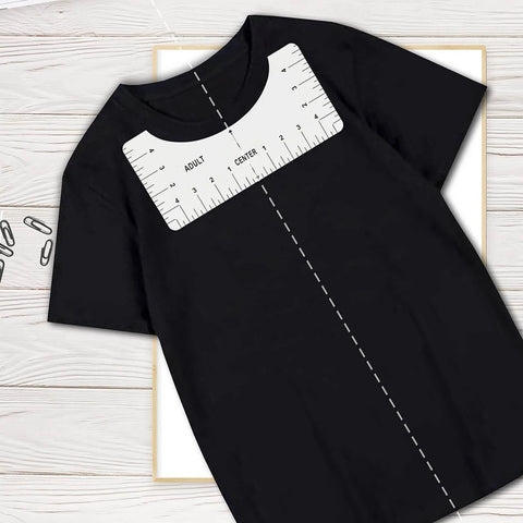 DIY T Shirt Alignment Tool Kit With Heat Resistant Tape And PTFE Teflon Transfer Sheets Four Ruler Sizes Two Rolls Heat Resistant Tape Three Packs PTFE Sheets And One Tape Measure Included For Quick Centered Transfers. Ruler centered on black shirt.