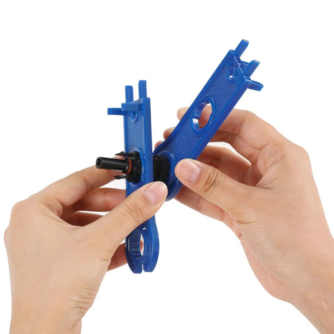 Hands using spanner from All In One Solar Crimping Tool Kit With 51 Pieces Includes 12 Pairs Of Solar Connectors 24 Connector Pins And 2 Spanners