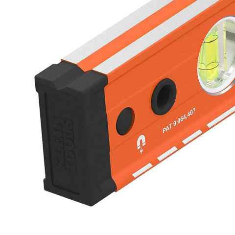 Dead Nuts Accurate 24 Inch Box Level With Lockdown Magnetic Base and Three High Vis Orange Vials Solid Aluminum Body from a side angle.