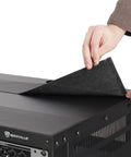 Person removing protective covering from Hella Sturdy 10U Rolling Audio Rack Case for Live Sound and Recording Studio Gear.
