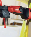 High Speed Drywall Screwdriver SD 4500, 120V 740W in use with magnetic bit holder, depth gauge visible, installing drywall.