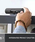 Built Different Brio 501 Full HD Webcam With RightLight 4 Tech 1080p Video Call Camera showing integrated privacy shutter in use.