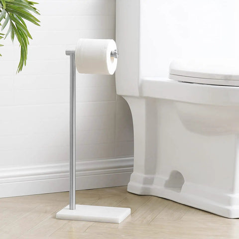 Natural Marble Toilet Paper Holder Stand Freestanding Stainless Steel with Brushed Finish next to a toilet in bathroom.