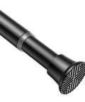 Close-up of adjustable black tension curtain rod 24 to 46 inches, stainless steel, no drilling, for windows and closets.