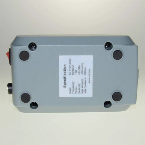 Bottom view of Palm Sized Lab Dual Function Vacuum And Pressure Pump For Filtration And Distillation showing specifications label.