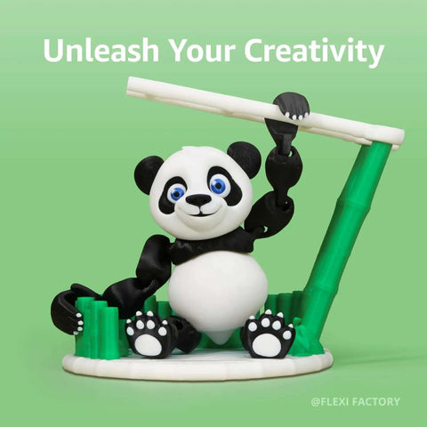 3D printed black and white panda figurine made with PLA Basic Filament 1.75mm 1kg Spool For 3D Printing on green background