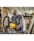 Robust 15 Amp Corded Plunge Router Equipped With Built In Led And Spindle Lock delivers precise routing in a workshop.