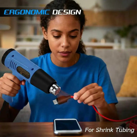 Person using Powerful 900W Heat Gun With Dual Temperature Settings 572 F And 1112 F Overload Protection for electronics repair