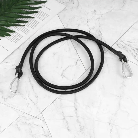 Heavy Duty Motorcycle Luggage Straps 4 Pack With Carabiners Elastic Tie Down Straps coiled on marble surface