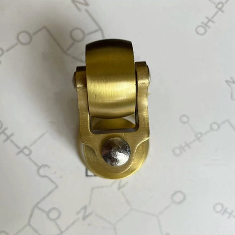 Solid Brass Furniture Casters Straight Up Heavy Duty Swivel Wheels Vintage Round Cup Base showing a top view of the brass swivel caster.