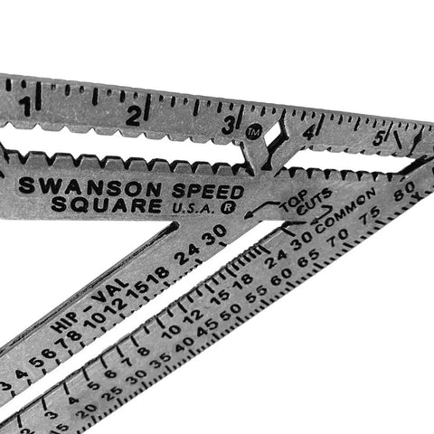 Kill Precision Work With This 7 Inch Speed Square Layout Tool Featuring Double Stud Wall Guides and Quick Pitch Angle Marks for Bang On Measurements and Smooth Framing Jobs Crafted For Hardworking Tradespeople Everywhere showing metal scale details.