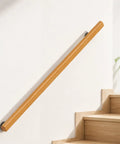 Real Deal Pine Wood Stair Handrail With Smooth As Butter Grip And Rock Solid Metal Brackets Guaranteed Indoor Guardrail Kit on a wall.