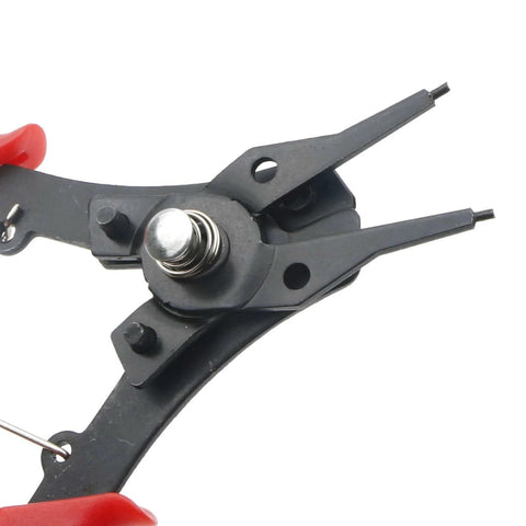 Close-up of 4 In 1 Snap Ring Pliers Set For Removing Retaining Clips Circlips And Snap Rings With Internal External Jaws.