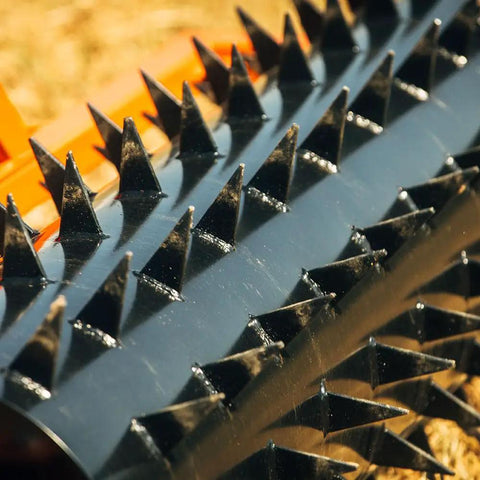 Close-up of spikes on Six Foot Drum Spike Aerator for 3 Point Hitch on Cat 1 and Cat 2 Tractors, tow behind lawn tool