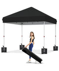 Woman setting up 10x10 Pop Up Canopy Tent With One Button Push Setup Heavy Duty Outdoor Shelter in black with roller bag and weights