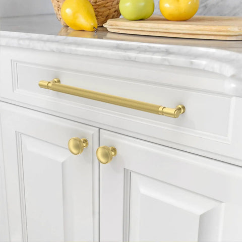 Brushed gold cabinet pull with knurled grip on white kitchen cabinets, showcasing 10 Pack 10 Inch Brushed Gold Cabinet Pulls Featuring Knurled Grip And Legit Solid Zinc Make Perfect For Kitchens And Cupboards Delivering Rugged Durability And A Sweet Hardware Upgrade To Your Daily Drawer Routine.