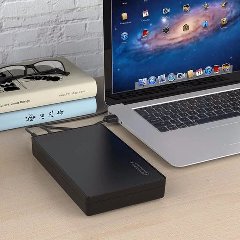 Built Tough Sata To Usb 3.0 External Hard Drive Enclosure and Universal Docking Station for workspace with laptop and books