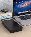 Heavy Duty 3.5 And 2.5 Inch External Hard Drive Docking Station With Usb 3.0 To Sata Iii Adapter connected to a laptop.