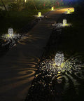 Pathway illuminated by bronze decorative solar lanterns, 2 pack upgraded solar lanterns for outdoor use, 15 lumens, waterproof.