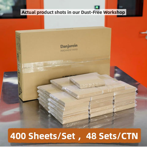 Heavy Duty 6X6 Inch Pre Cut Parchment Paper Squares 19200 Ct Bulk Case stacked in workshop with packaging.