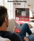 Man using smartphone to monitor Smart WiFi Radon Detector For Home With Instant App Alerts And Continuous Daily Trend Tracking To Keep Indoor Air Crisp And Your Place Hella Safe All Year Long.